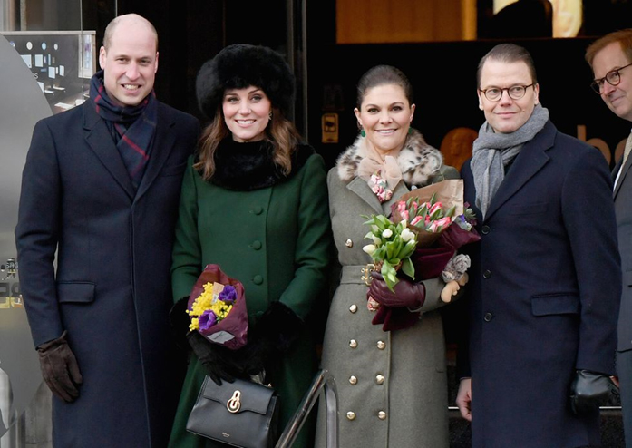 POSING FOR A PHOTO WITH CROWN PRINCESS VICTORIA OF SWEDEN AND PRINCE DANIEL OF SWEDEN