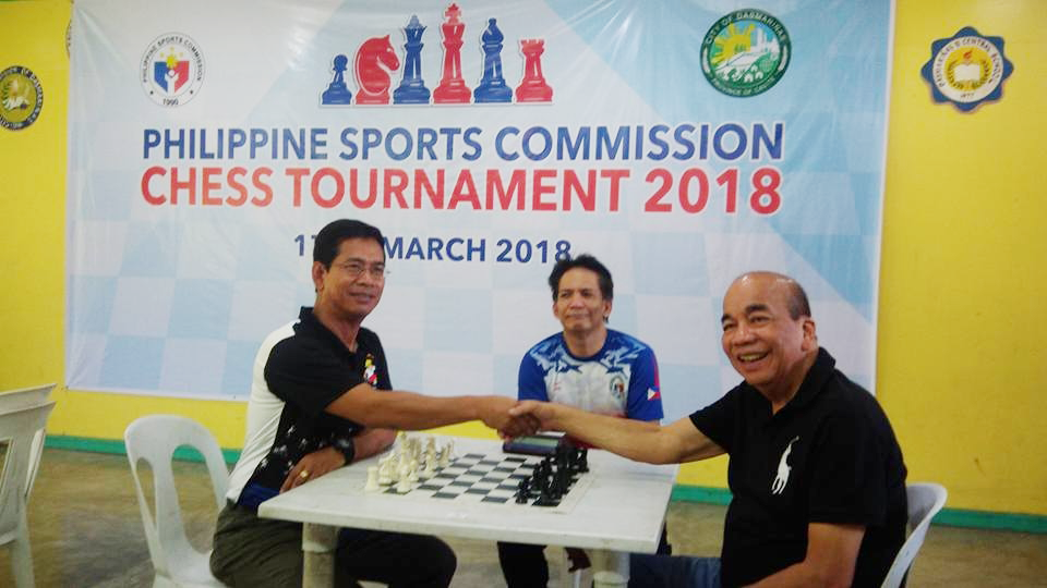 Photo shows PSC commissioner Arnold Agustin (left) made a traditional ceremonial moves with Dasmariñas City mayor Elpidio "Pidi" Barzaga Jr. (right) to formally open the Philippine Sports Commission (PSC) Chess Tournament 2018 held at the Dasma 2 Central Elementary School near in SM Hyper Market Kadiwa in Dasmariñas City, Cavite over the weekend. Also in photo is eventual champion Grandmaster (GM) Rogelio "Joey" Antonio Jr. (center).