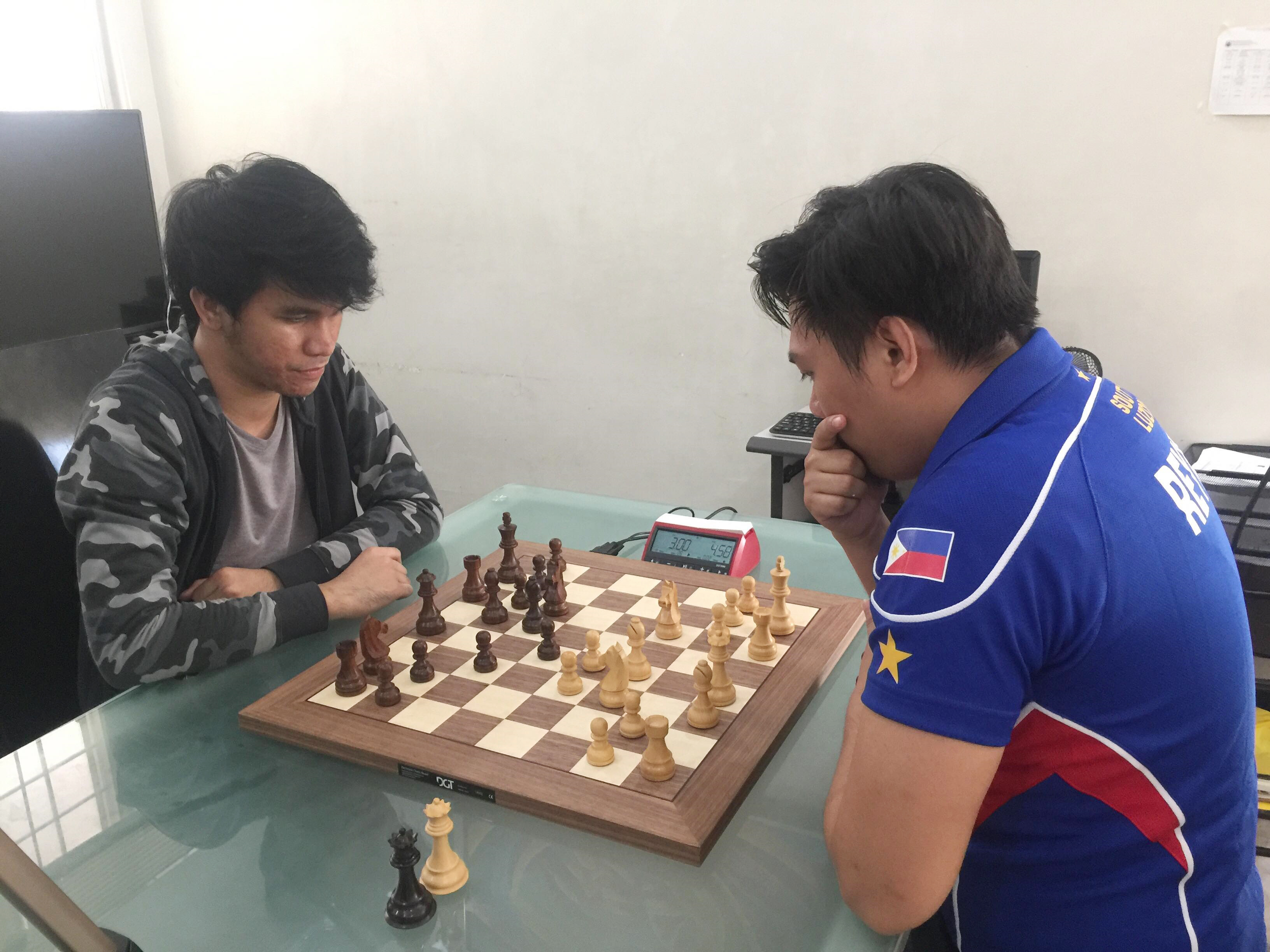Photo shows from left to right the final match between Tyrone delos Santos of Knights of Columbus chess team versus Narguingel Reyes of Iglesia ni Cristo Chess Team during the National Chess Federation of the Philippines (NCFP) team tournament last Saturday, March 17, 2018. All games broadcast live worldwide through the Youtube channel of the National Chess Federation of the Philippines (NCFP).