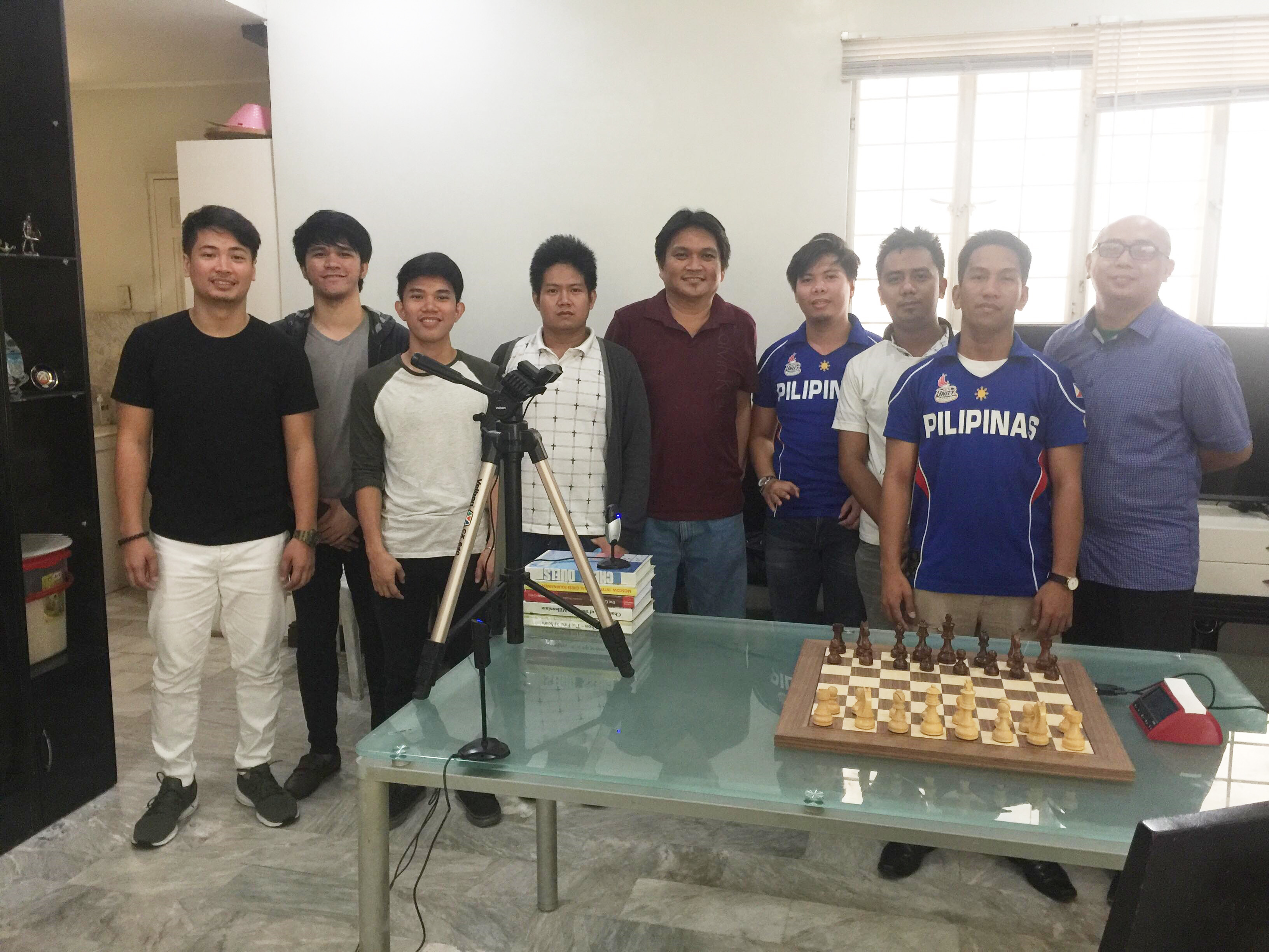 Photo shows Team Manager Christopher "Kuya Chris" De Guzman (center) in a group photo together with from left to right Makoy Mabasa, Tyrone delos Santos and John Michael Magpily, Walt Talan of Knights of Columbus chess team, Narguingel Reyes, Alexis Emil Maribao, Genghis Katipunan Imperial and Ravel Canlas of Iglesia ni Cristo Chess Team during the National Chess Federation of the Philippines (NCFP) team tournament last Saturday, March 17, 2018. All games broadcast live worldwide through the Youtube channel of the National Chess Federation of the Philippines (NCFP).