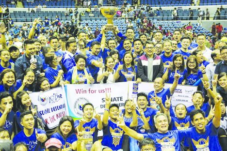 Members of the Senate Defenders, led by Senators Sonny Angara and Joel Villanueva, are shown with UNTV president and CEO Dr. Daniel Razon after ruling the 6th UNTV Cup Season 6. With them are Senators Franklin Drilon and Juan Miguel Zubiri.