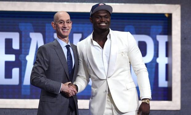 Zion Williamson with NBA commissioner Adam Silver after being drafted with the first overall pick. Photograph: Sarah Stier/Getty Images  
