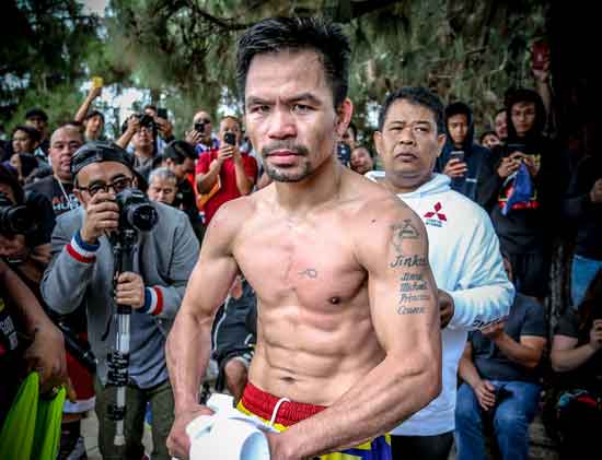 Manny Pacquiao strikes a pose after a workout on Saturday morning at the Griffith Park in Los Angeles, California. PHOTO BY WENDELL ALINEA