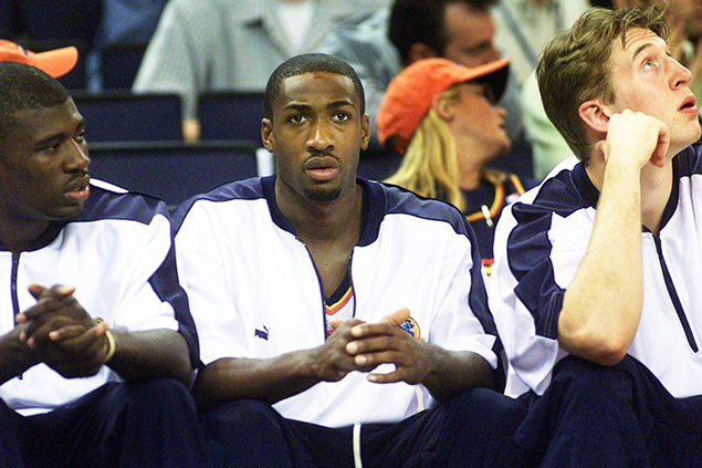 (Left to right) Warriors rookies Jason Richardson, Gilbert Arenas, and Troy Murphy on the bench at the Coliseum Arena.