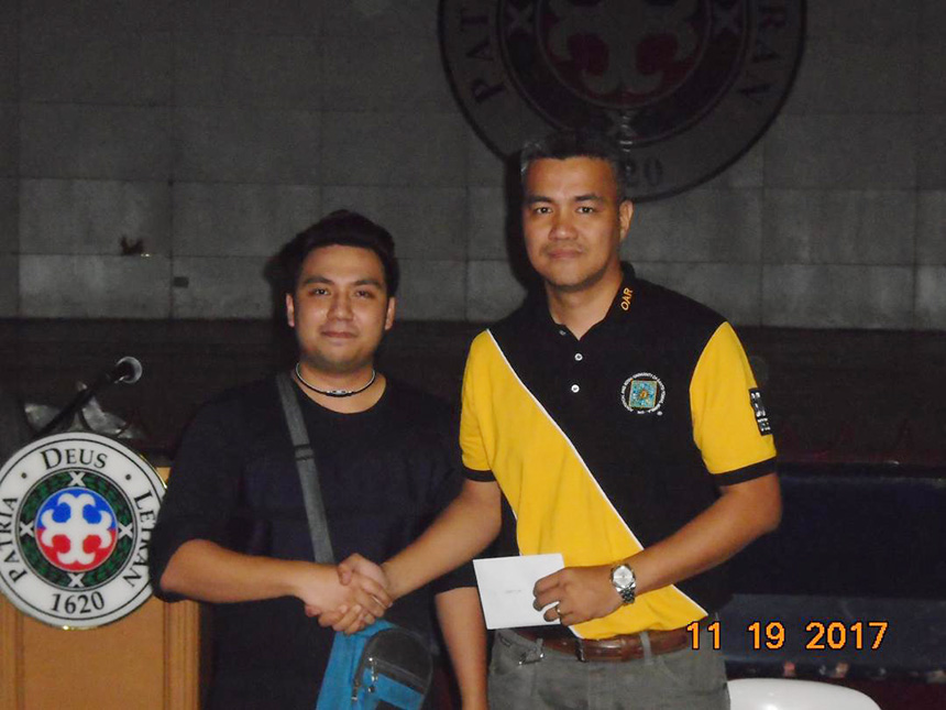 Photo shows Fide Master Nelson "Elo" Mariano II (left) congratulates GM elect Ronald Dableo (right) after winning the 2nd Red Kings Chess Tournament Open individual event Sunday, November 19, 2017, at the Colegio de San Juan de, Letran Gymnasium, (College Gym) in Intramuros, M a n i l a.