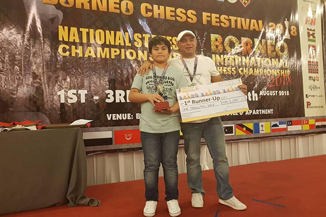 (Photo shows Fide Master (FM) Alekhine Fabiosa Nouri, Junior division champion and International Master (IM) Hamed Nouri, Open division co-champion in the just ended Borneo International Chess Championship 2018 (Rapid Fide rated) was held in Kota Kinabalu, Sabah, Malaysia over the weekend.)